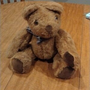 OLDER teddy bear, arms move legs move